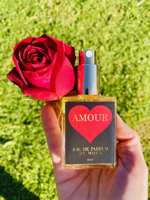 Amour Eau de Parfum de Moea – Organic aphrodisiac perfume in elegant bottle with gold lid.